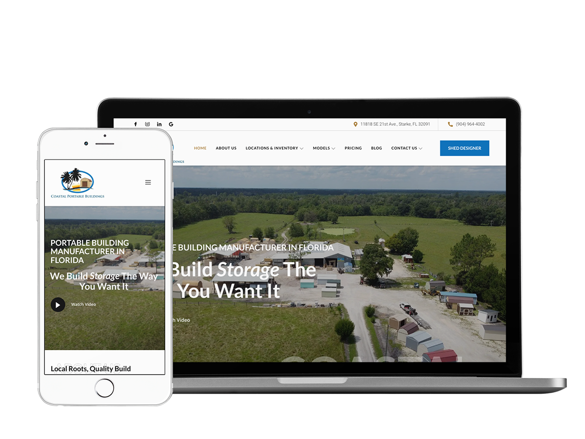 A portable tablet displaying a website for Coastal Portable Buildings, a construction company.