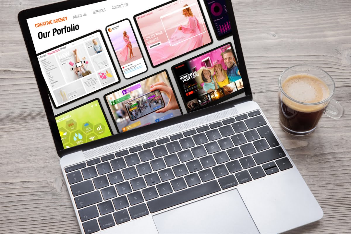 A laptop with a cup of coffee next to it on a one page website.