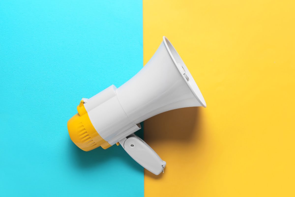 A captivating value proposition embodied by a white megaphone on a vibrant background.