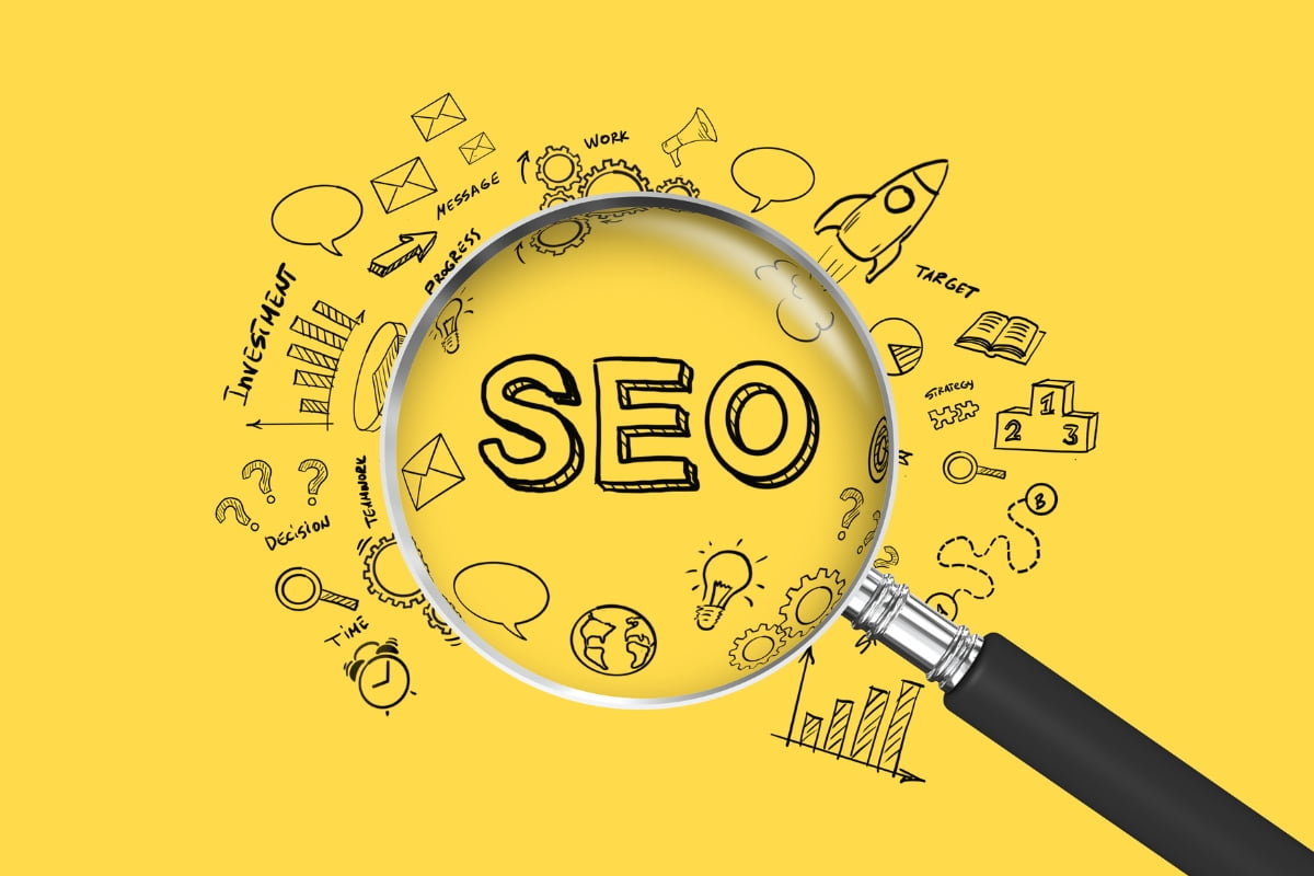 A magnifying glass with the word SEO on it, perfect for conducting an SEO checklist.