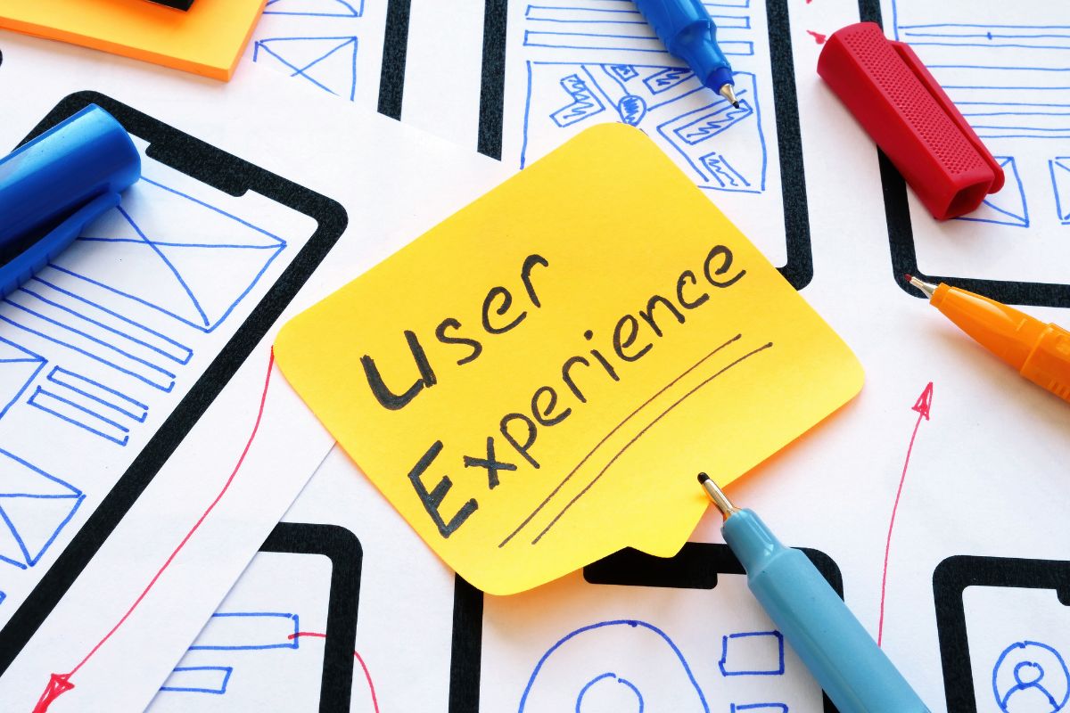 A sticky note with the words "user experience" and "domain authority" on it.