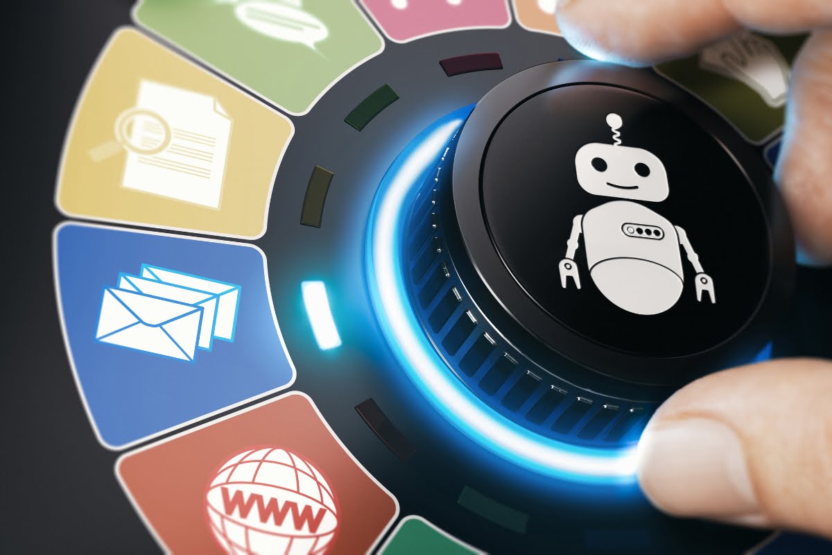 A person is utilizing marketing automation benefits by pressing a button with a robot on it.