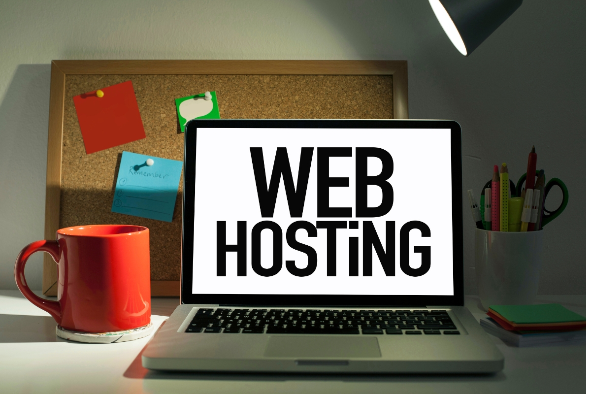 A laptop equipped with the best hosting for SEO, prominently displaying the term "web hosting".