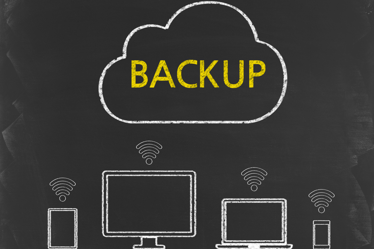 The word "backup" is drawn on a blackboard to emphasize the importance of regular WordPress updates.