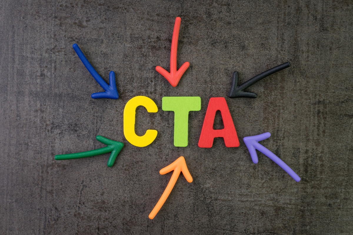 The word CTA surrounded by colorful arrows, emphasizing various call to actions.