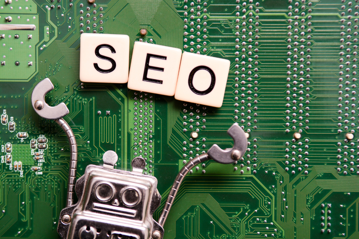 The word SEO is spelled out on a circuit board as part of creating a website.