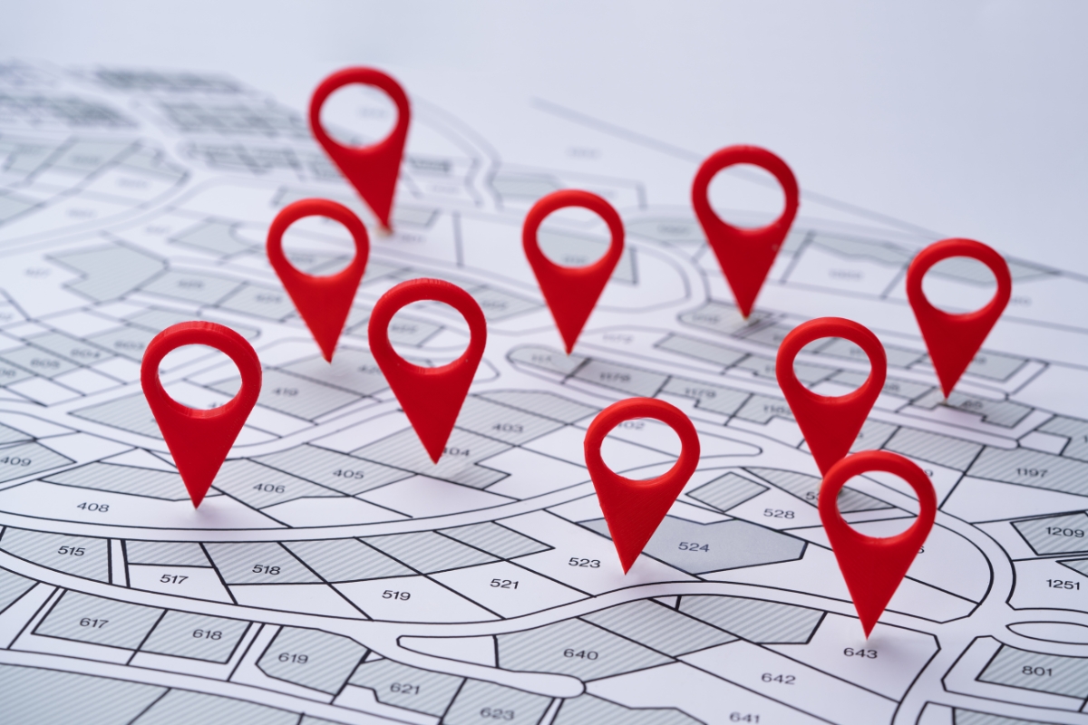 Red pins are placed on a map for local SEO citations.