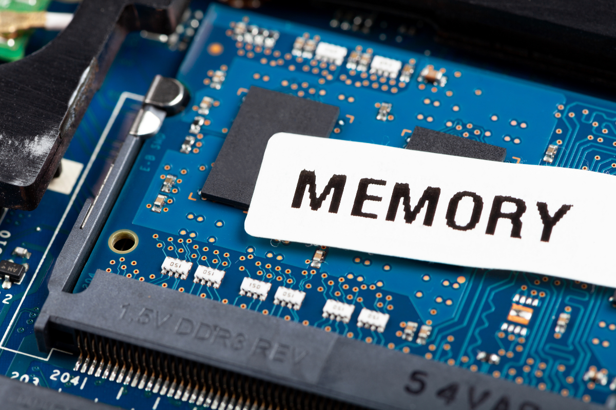 The word "memory" is written on top of a motherboard, showing the importance of web caching.