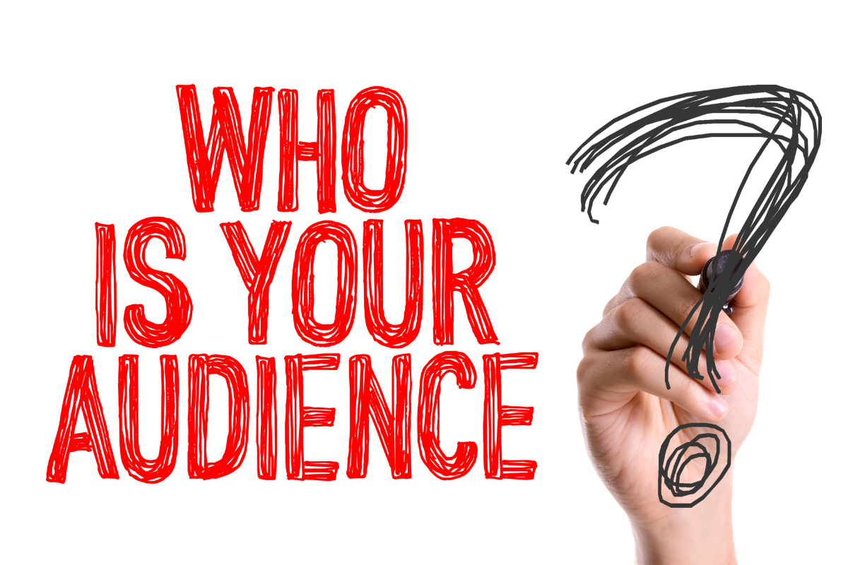 A hand writing "Who is your audience?"