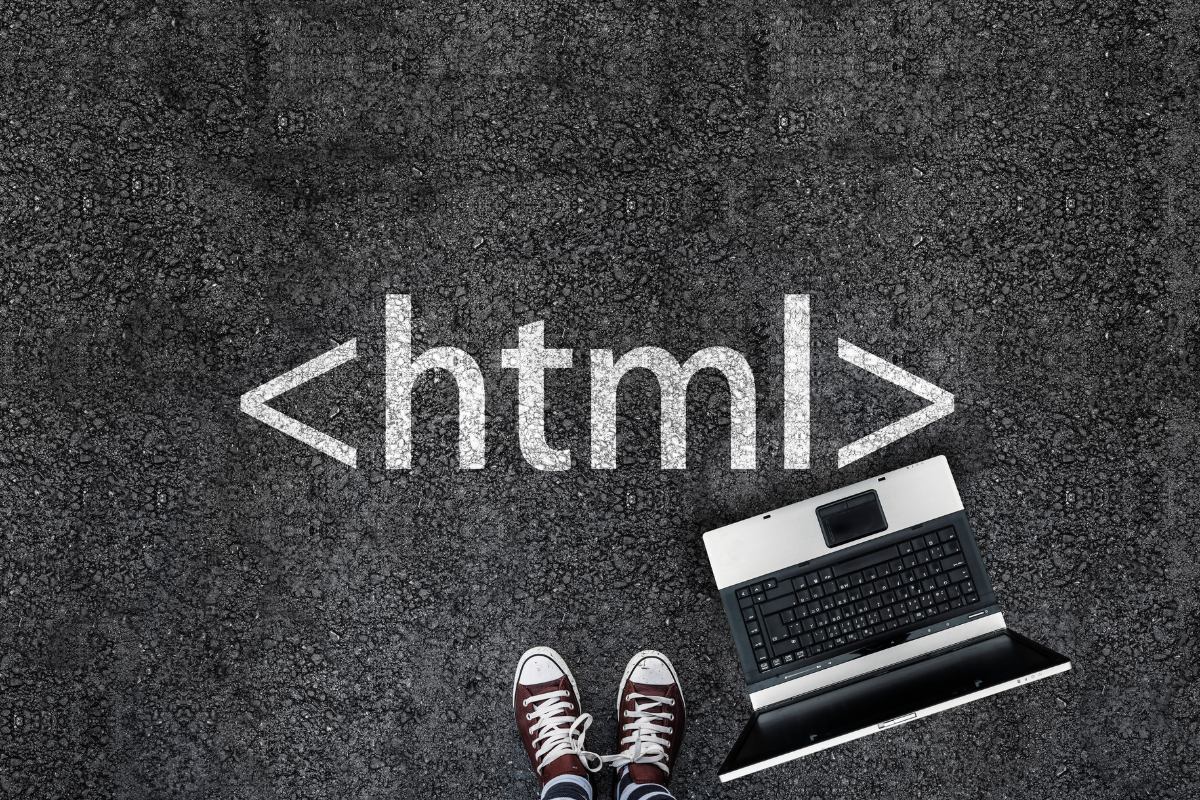 A laptop with the word HTML written on it is a component of a website.