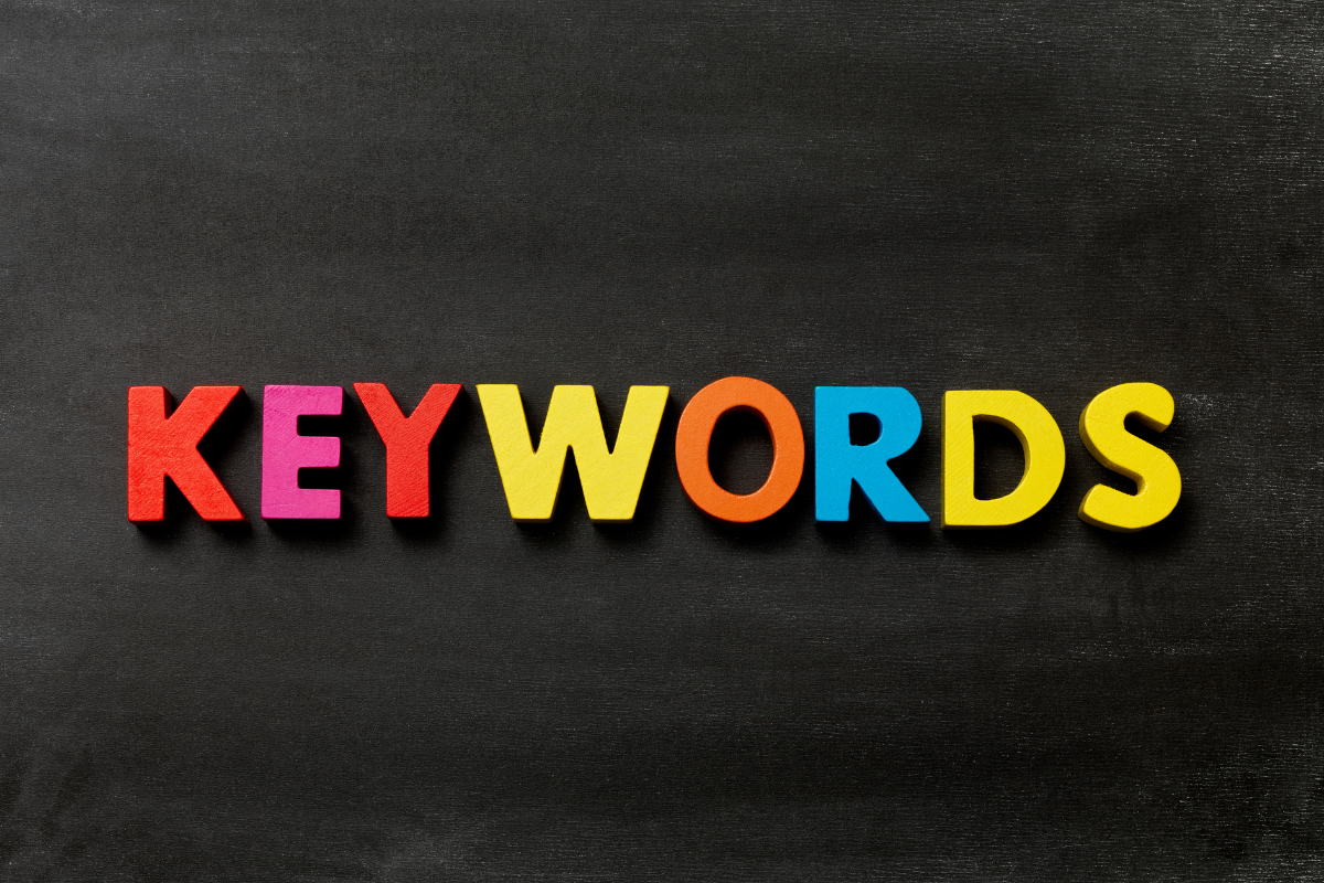 Keywords spelled out in colorful letters on a blackboard.