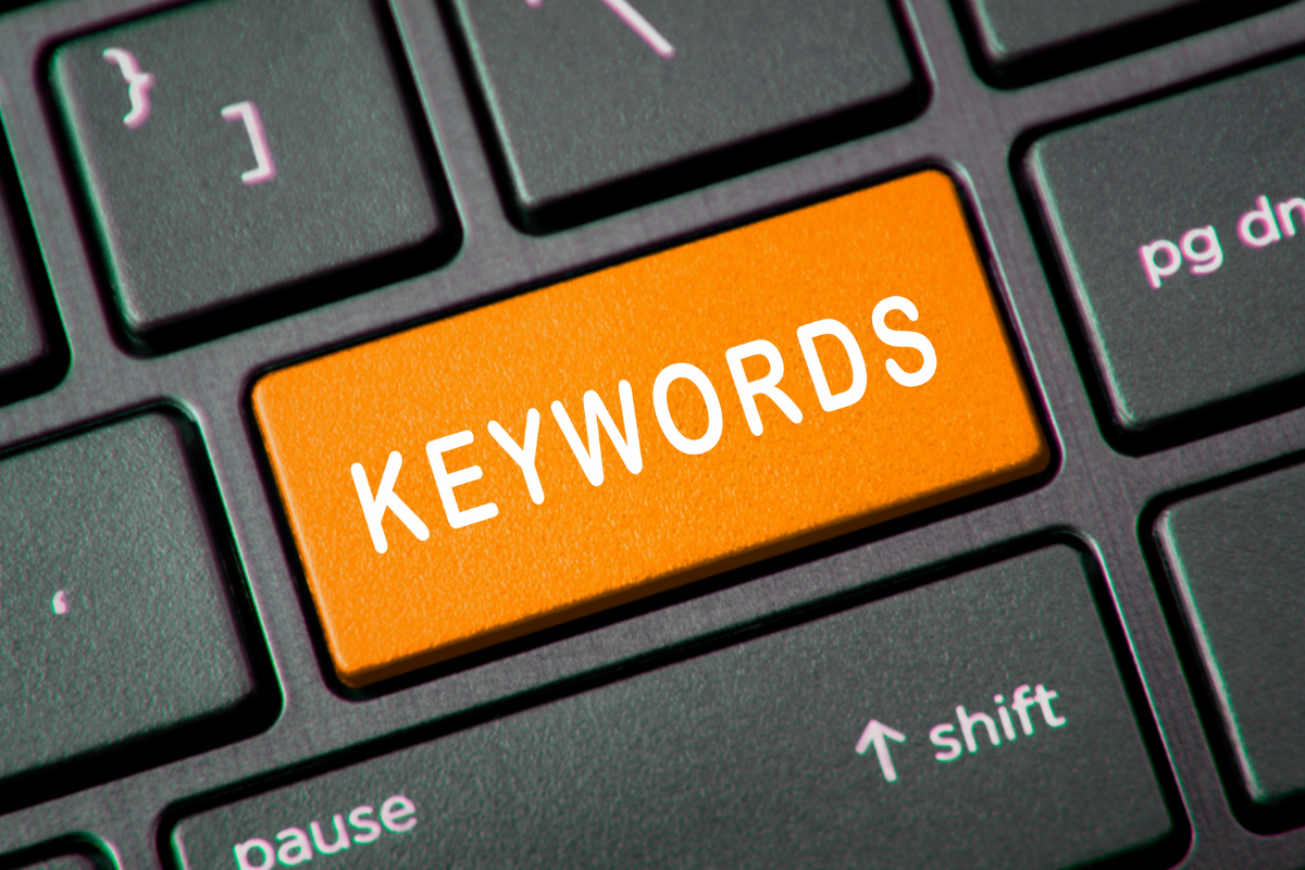 An orange button with the phrase "keywords" on it.