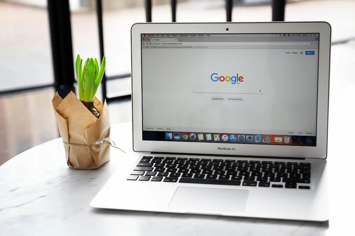 A laptop with Google Search Console on it sitting on a table.