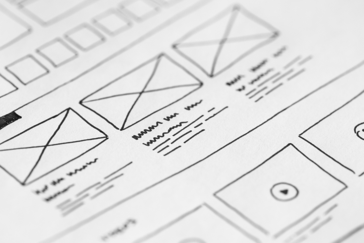 A close-up of a wireframe sketch demonstrating how to create wireframes for website layout design.