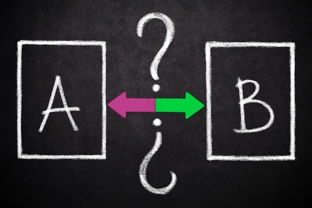 A chalk drawing of a question mark between letters A and B.