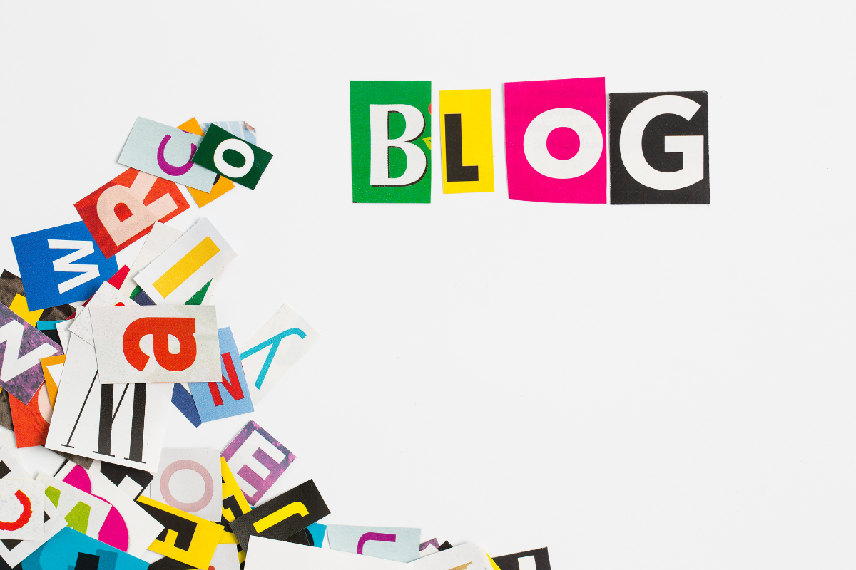 A pile of colorful paper with the word "blog."