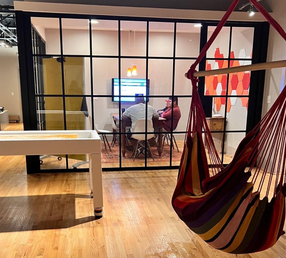 An office with a hammock chair, ideal for a technical SEO company.